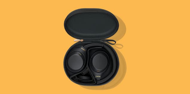 Sony WH-1000XM4 Headphones with their carry case and cables